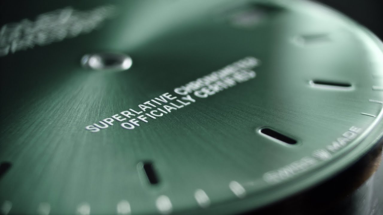 Close-up of green watch dial